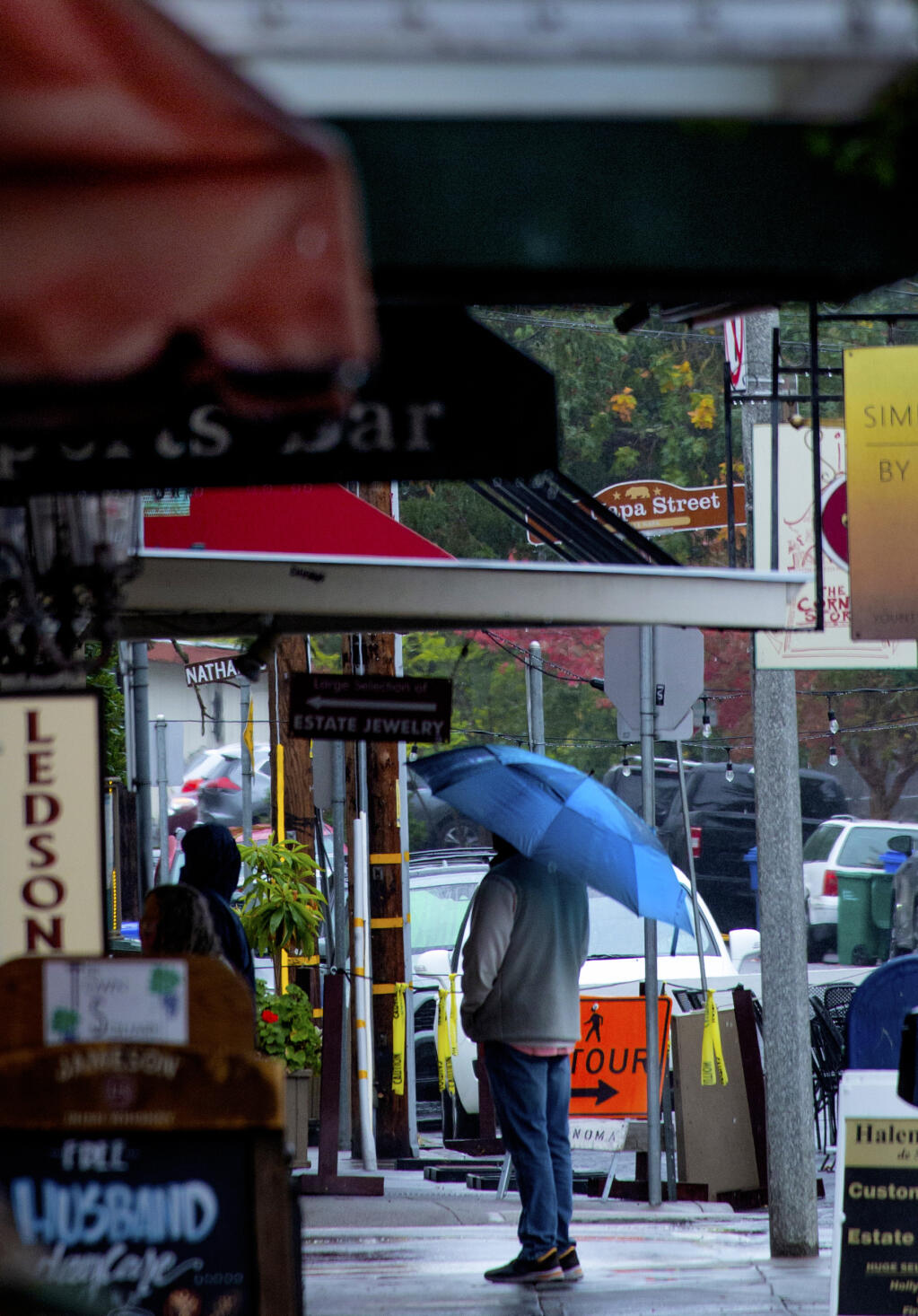 Umbrellas were finally put to use on First Street East when it rained in Sonoma on Wednesday morning, Oct. 20, 2021. (Photo by Robbi Pengelly/Index-Tribune)