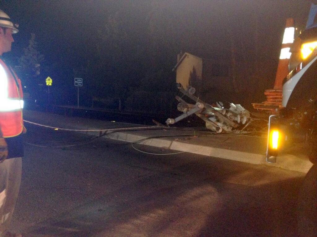 A power pole on Bodega Avenue in Sebastopol toppled Thursday night, knocking out power to more than 5,000 people. (Courtesy of Frankie Travis)