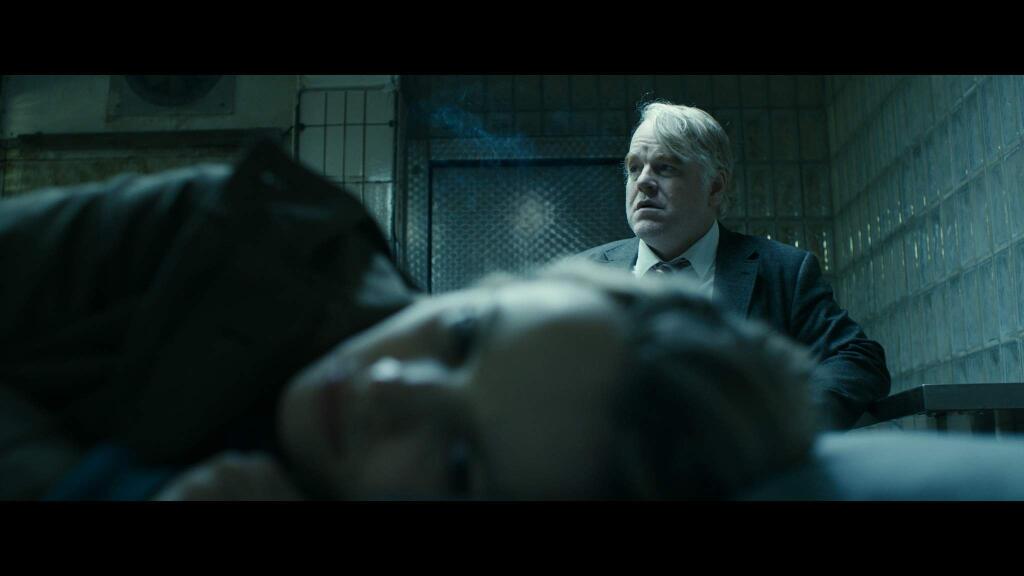 This photo provided by the Sundance Institute shows Philip Seymour Hoffman, right, and Rachel McAdams, front, in a scene from the film, 'A Most Wanted Man,' which premiered at the 2014 Sundance Film Festival. After appearing in over 50 movies, 46-year-old Hoffman says working on “A Most Wanted Man” was one of the most satisfying movie-making experiences he's had. (AP Photo/Sundance Institute)