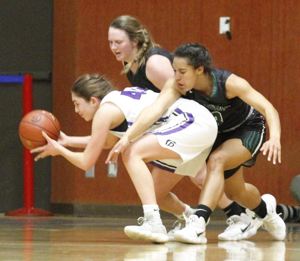 Bill Hoban/Index-TribuneSonoma's annie Neles, back, and Kaliyah Hensic, try to trap a Petaluma player in a recent game. The Lady Dragons had their season ended Tuesday when Campolindo beat them in the opening round of the North Coast Section Tournament.