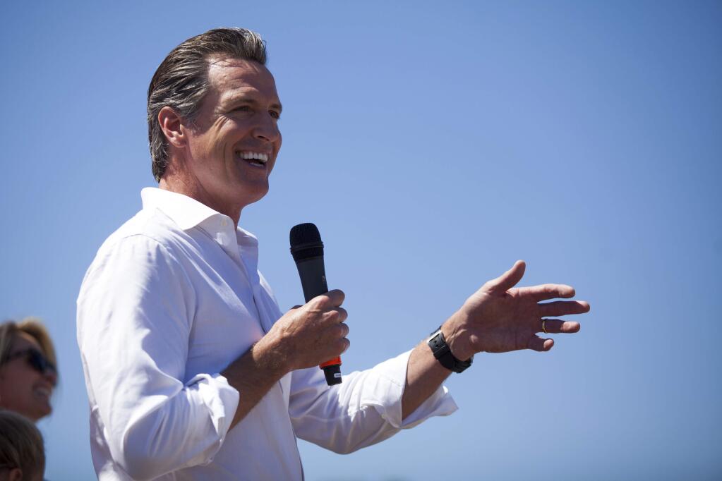 Gavin Newsom, the lieutenant governor and the Democratic candidate for California governor, at a campaign event in Huntington Beach, Calif., Sept. 15, 2018. Newsom is running for governor of California - but you'd barely know it by following him on the campaign trail as he talks about everything but. (Jenna Schoenefeld/The New York Times)