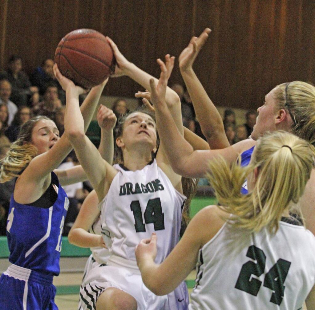 Bill Hoban/Index-TribuneSonoma's Sydney VonGober pulls down a rebound during Monday's game against Analy. The Lady Dragons, who led by only two points at the half, turned it on in the second half and won going away, 49-31.