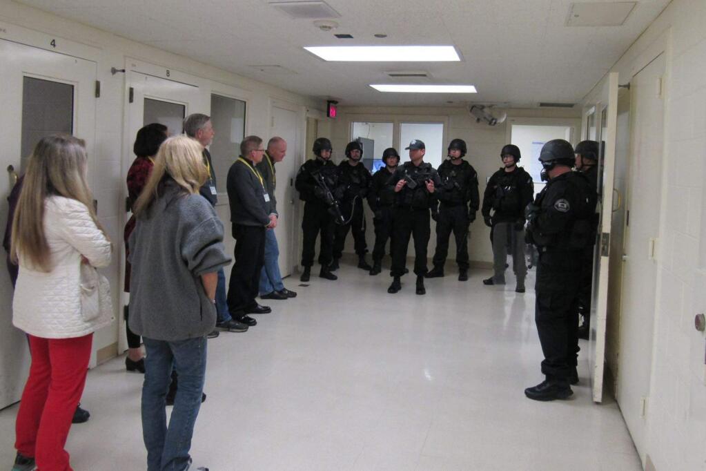 Attendees of an earlier Citizen's Academy learn about the County Sheriff's Specialized Emergency Response Team during a demonstration at the Sonoma County Jail. (Submitted)