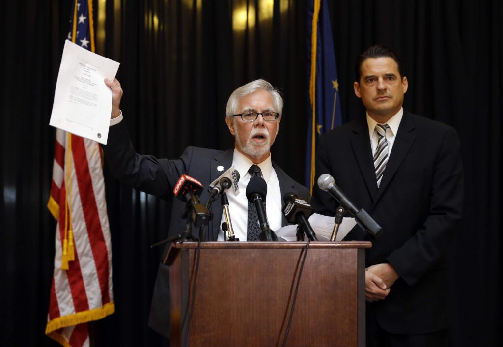 Indiana Senate Democratic Leader Tim Lanane, left, D-Anderson, and Indiana House Democratic Leader Scott Pelath, D-Michigan City, call for the repeal of the Indiana Religious Freedom Restoration Act during a news conference at the Statehouse in Indianapolis, Monday, March 30, 2015. Republican legislative leaders say they are working on adding language to a new state law to make it clear that it doesn't allow discrimination against gays and lesbians. (AP Photo/Michael Conroy)