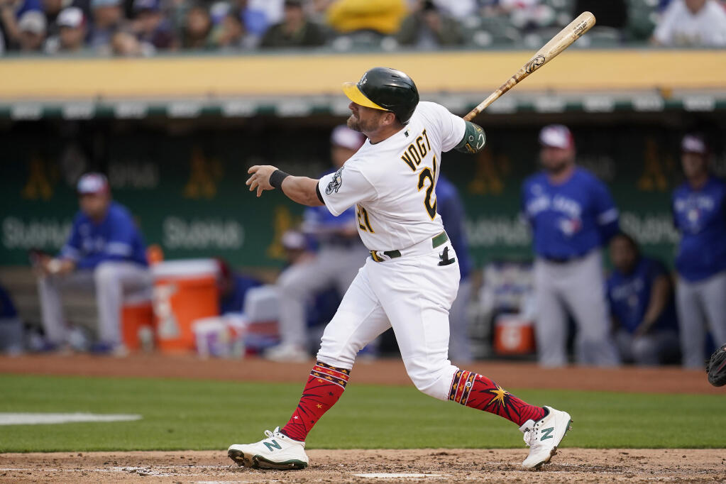 The Athletics’ Stephen Vogt watches his home run during the sixth inning against the Toronto Blue Jays in Oakland on  Monday, July 4, 2022. (AP Photo/Jeff Chiu)