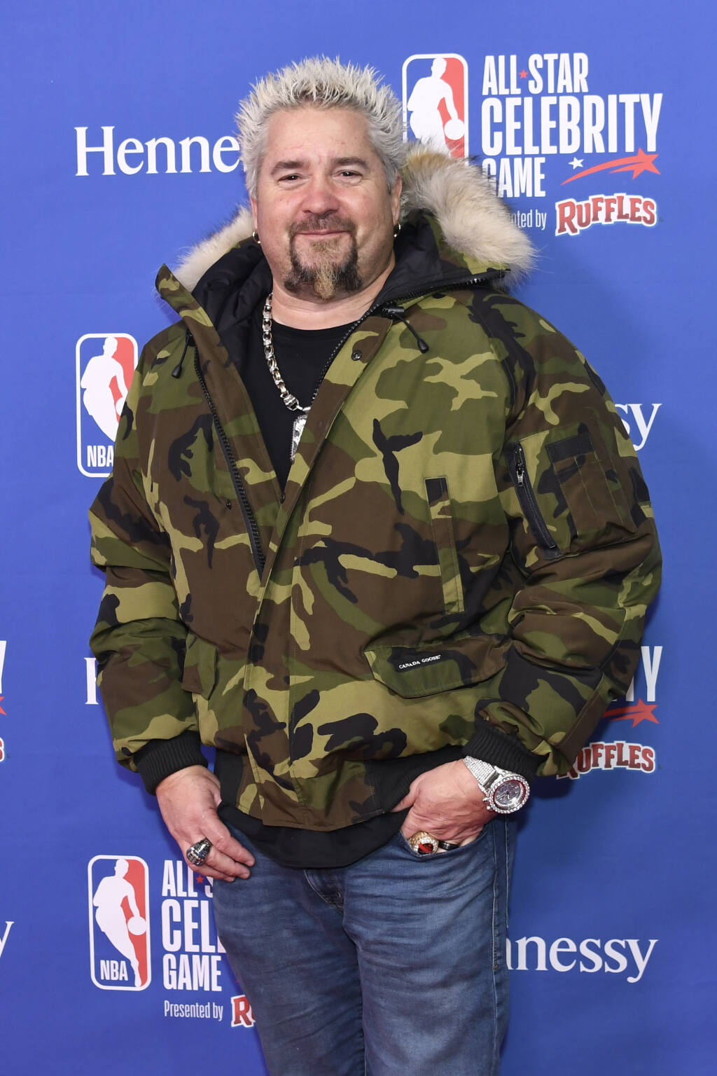 Guy Fieri arrives on the red carpet prior to an NBA Celebrity All-Star basketball game Friday, Feb. 14, 2020, in Chicago. (AP Photo/David Banks)