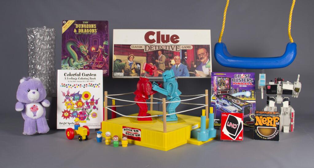 In this Aug. 10, 2016 photo provided by The Strong museum in Rochester, N.Y., are the 12 finalists for the class of 2016 for induction into the National Toy Hall of Fame: bubble wrap, Care Bears, Clue, coloring books, Dungeons & Dragons, Fisher-Price Little People, Nerf, pinball, Rock 'Em Sock 'Em Robots, swing, Transformers, and Uno. The winners will be chosen with input from a national selection committee and inducted on Nov. 10. (The Strong National Toy Hall of Fame via AP)