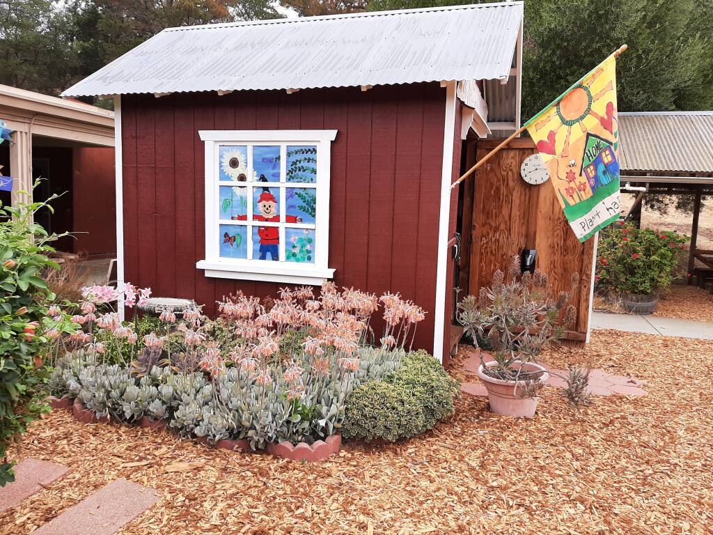 An outbuilding sports creative artwork at the teaching garden at Valley Vista Elementary School, 730 N. Webster St., in Petaluma. (COURTESY OF VALLEY VISTA ELEMENTARY SCHOOL).