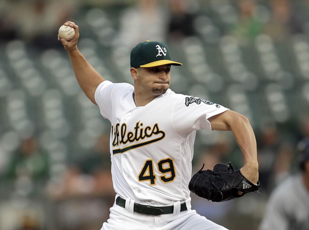 Oakland Athletics pitcher Kendall Graveman works against the Seattle Mariners in the first inning of a baseball game Monday, May 2, 2016, in Oakland, Calif. (AP Photo/Ben Margot)
