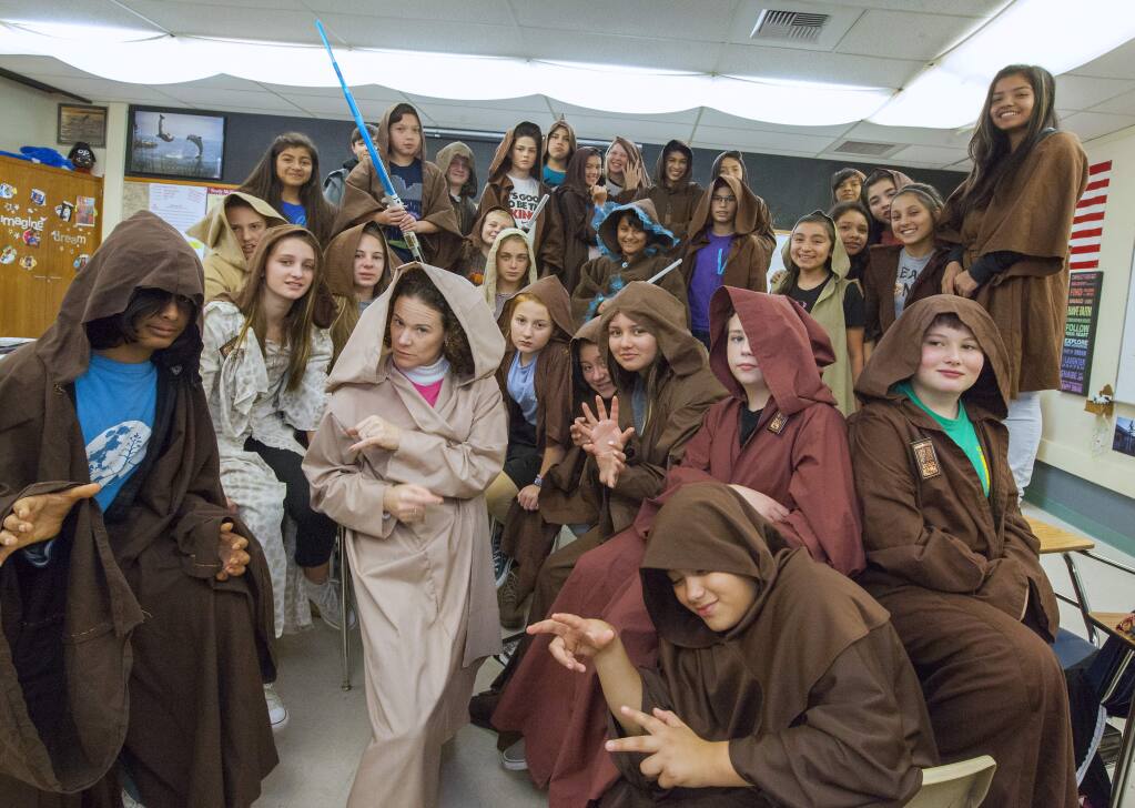 RETURN OF THE JEDI ENGLISH CLASS: Bridgett Pauls and her young Padawans will 'feel the tremors' at a private screening of the 'Force Awakens' Friday. (Robbi Pengelly/Index-Tribune)