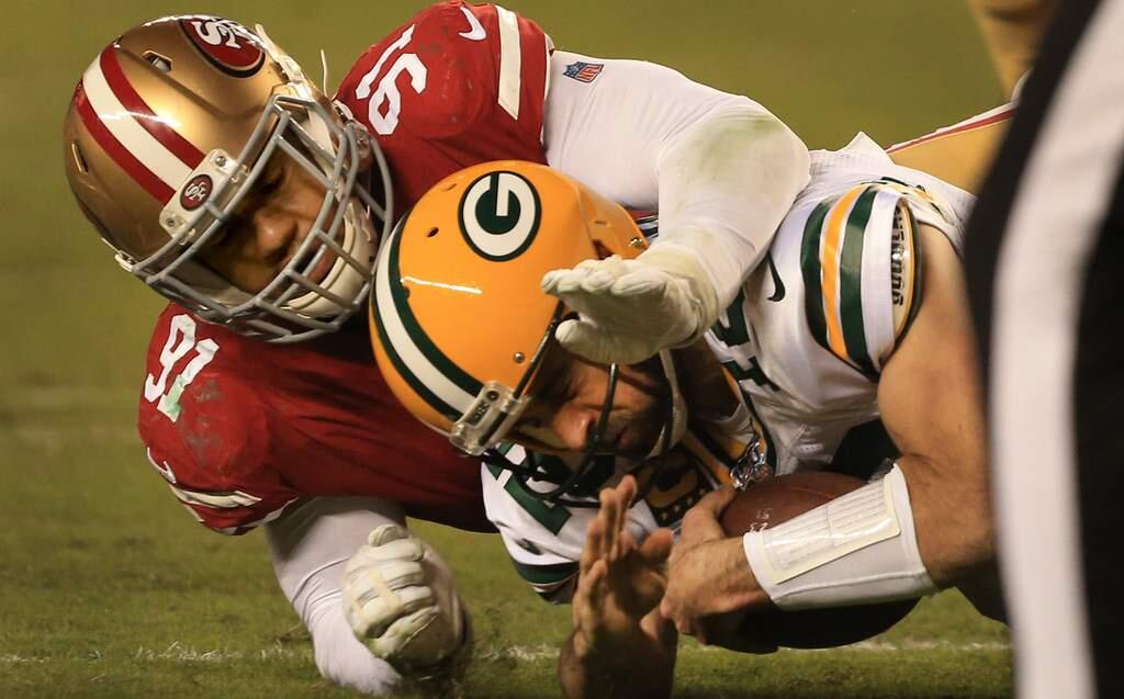 Aaron Rodgers was awful the first time the 49ers and Packers met this season, throwing for 104 yards, fumbling once and being sacked five times. (Kent Porter / The Press Democrat)