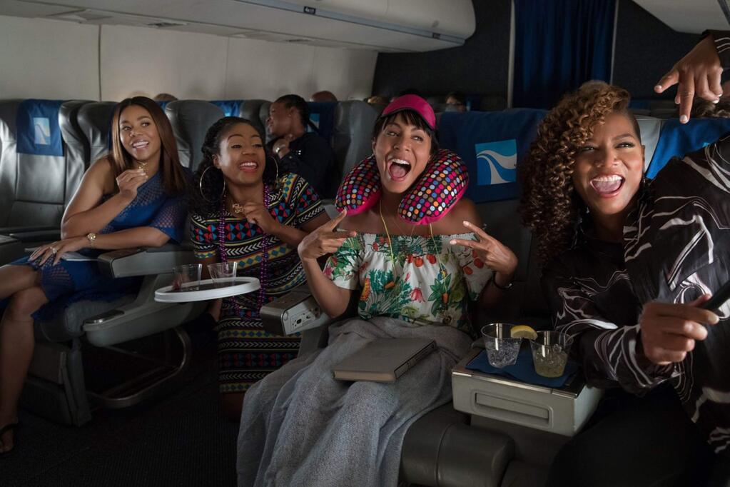 Regina Hall, Tiffany Haddish, Jada Pinkett Smith and Queen Latifah play college friends reuniting for a New Orleans weekend during the Essence Festival in 'Girls Trip.' (Universal Pictures)