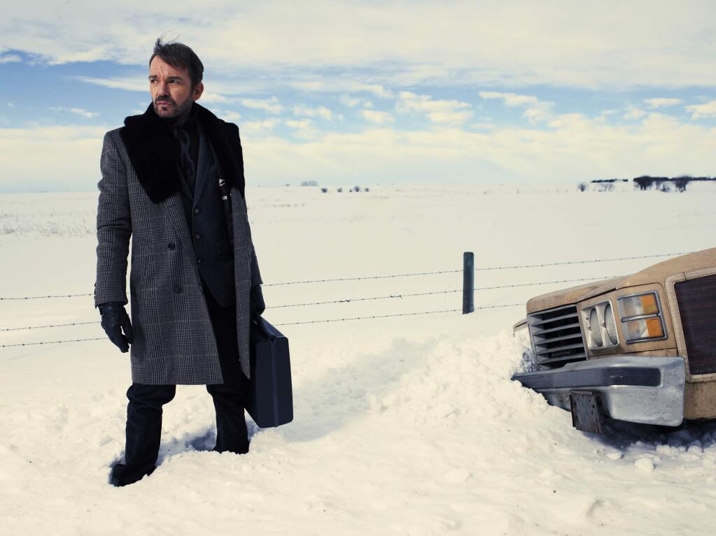 This photo released by FX Networks shows Billy Bob Thornton as Lorne Malvo in 'Fargo,' season one. The TV series has 18 nominations and one win for the 2014 Emmy Awards. The 66th Primetime Emmy Awards are on Monday, August 25, 2014. (AP Photo/Matthias Clamer/FX)