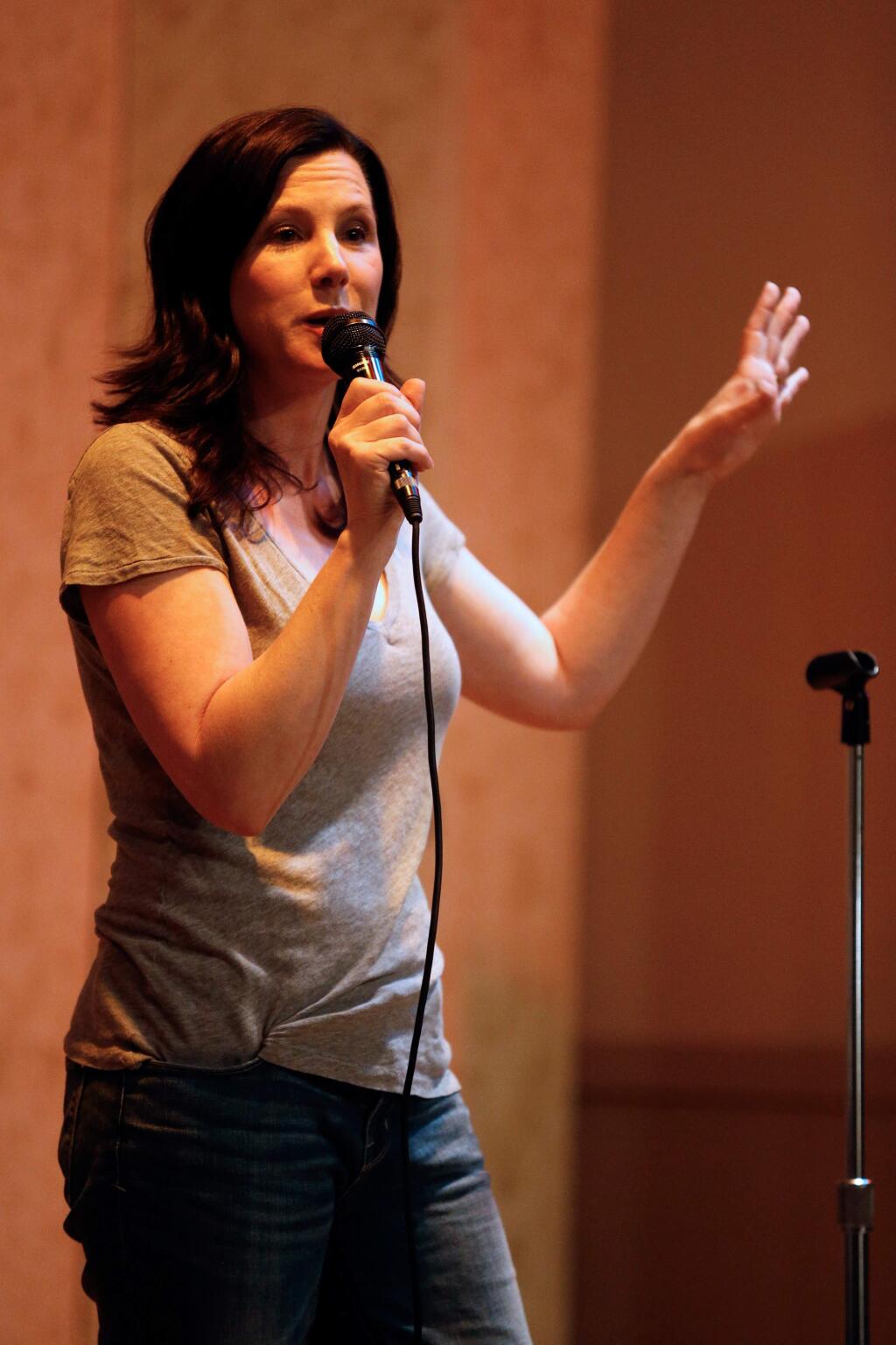 Comedian Jill Maragos goes through her routine during a fundraiser for She Can, a new nonprofit resource for pregnant and parenting teens, in Santa Rosa, California on Friday, April 8, 2016. (Alvin Jornada / The Press Democrat)