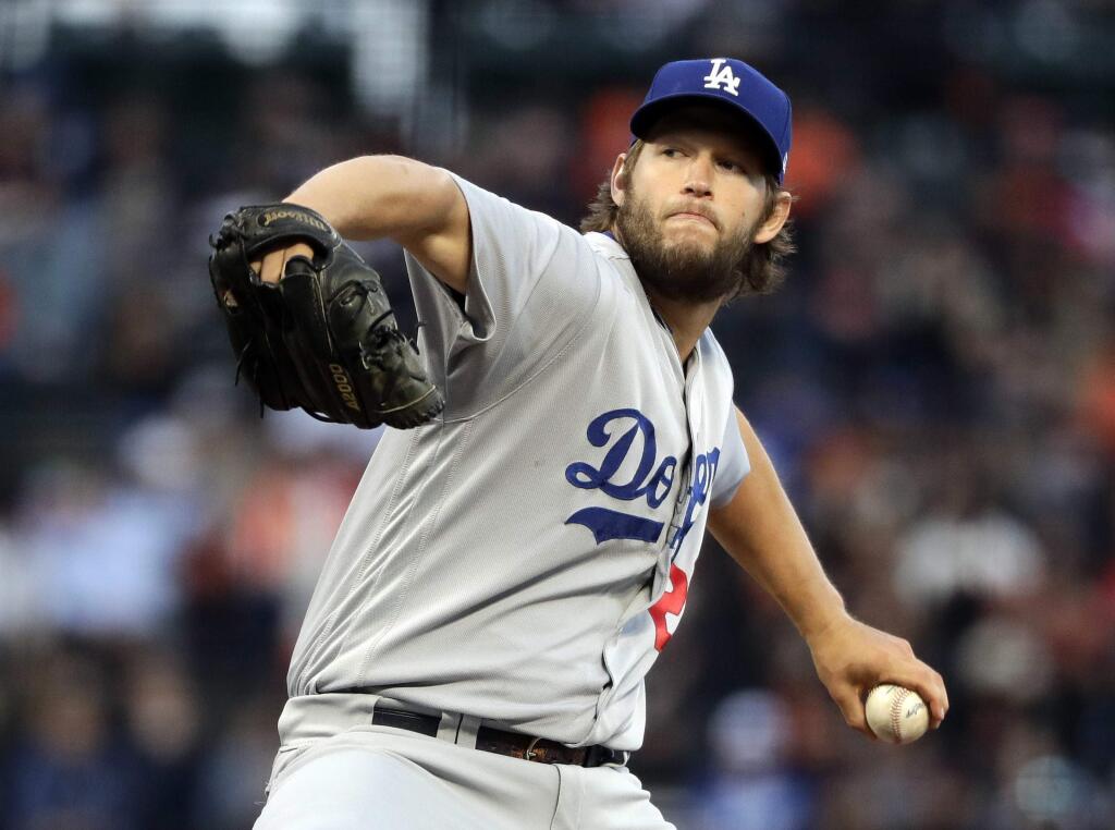 Los Angeles Dodgers starting pitcher Clayton Kershaw throws to a San Francisco Giants batter during the first inning of a baseball game Tuesday, April 25, 2017, in San Francisco. (AP Photo/Marcio Jose Sanchez)