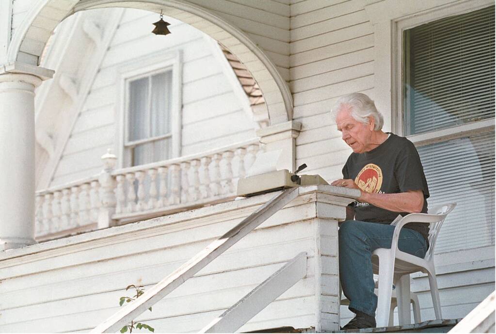 Former Argus-Courier columnist Bill Soberanes, pictured here in this Argus file photo, types away on his front porch. (LEENA HINTSANEN/ARGUS-COURIER STAFF)
