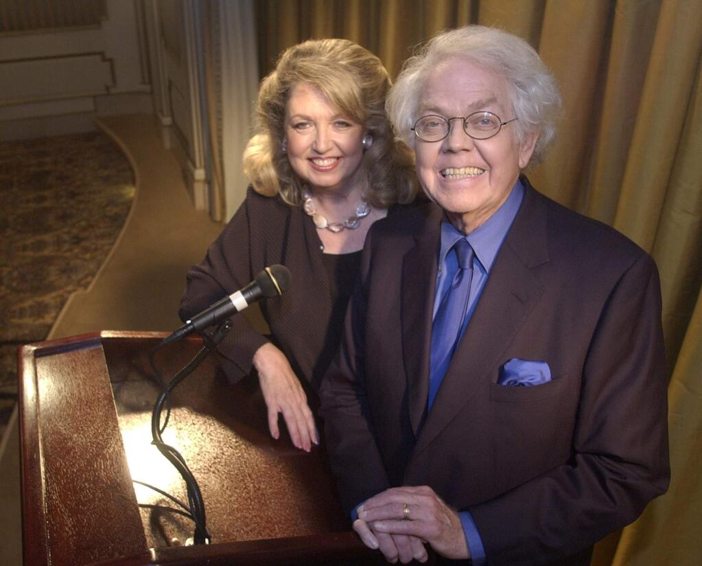 FILE - In this July 25, 2003 file photo, satirist Stan Freberg, 76, right, and his wife, Hunter, pose for a photo Beverly Hills, Calif. Freberg, the writer and comedian who lampooned American life in 'The United States of America' and other landmark comedy albums and was hailed as the father of the funny commercial, has died at age 88. Freberg's wife, Hunter, says the humorist died Tuesday, April 7, 2015, at the UCLA Medical Center in Santa Monica. (AP Photo/Matt Sayles, File)