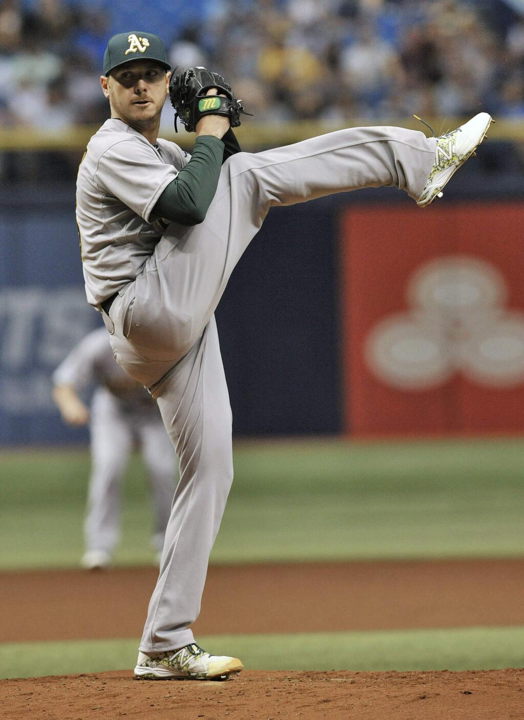 Oakland Athletics starter Scott Kazmir pitches against the Tampa Bay Rays during the first inning of a baseball game Friday, May 22, 2015, in St. Petersburg, Fla. (AP Photo/Steve Nesius)