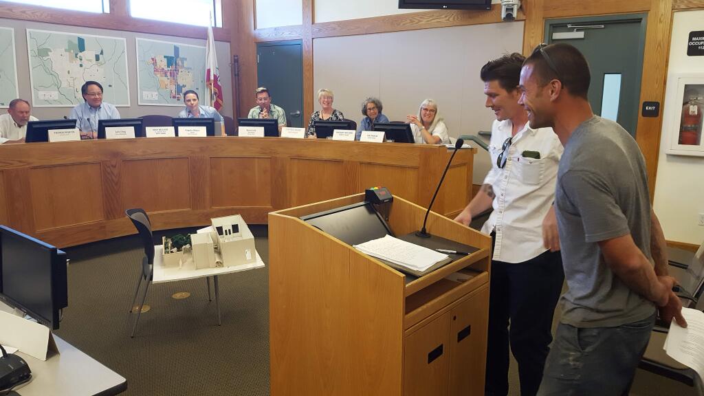 Presenters from Mercado Central show off their plans for the former Uncle Patty's Bar & Grill to the Sonoma Valley Citizens Advisory Commission. Standing at the podium are Joe Waikiki (foreground) and Morgan Grimm, an architect with the project. (Christian Kallen/Index-Tribune)