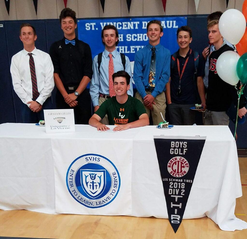 JOHN JACKSON/ARGUS-COURIER STAFFGraham Gilles, surrounded by the champion St. Vincent golf team, signs to continue playing golf and study at La Verne University in Southern California.