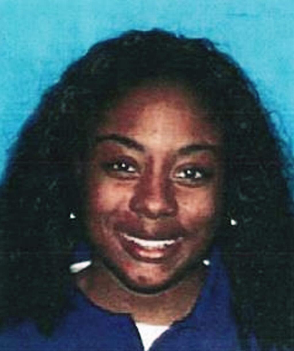In this undated photo released by the Sacramento Police Department is Perrean Gray. Police in Northern California say they've used new DNA technology to identify a victim found burning in a garbage bin 18 years ago. Sacramento police said Tuesday, Nov. 26, 2019, that firefighters found a woman's body when they put out the blaze early on June 29, 2001. Investigators recently tracked DNA through a private genealogy laboratory to identify the woman as Perrean Gray, who had been reported as a missing person in San Francisco. (Sacramento Police Department via AP)