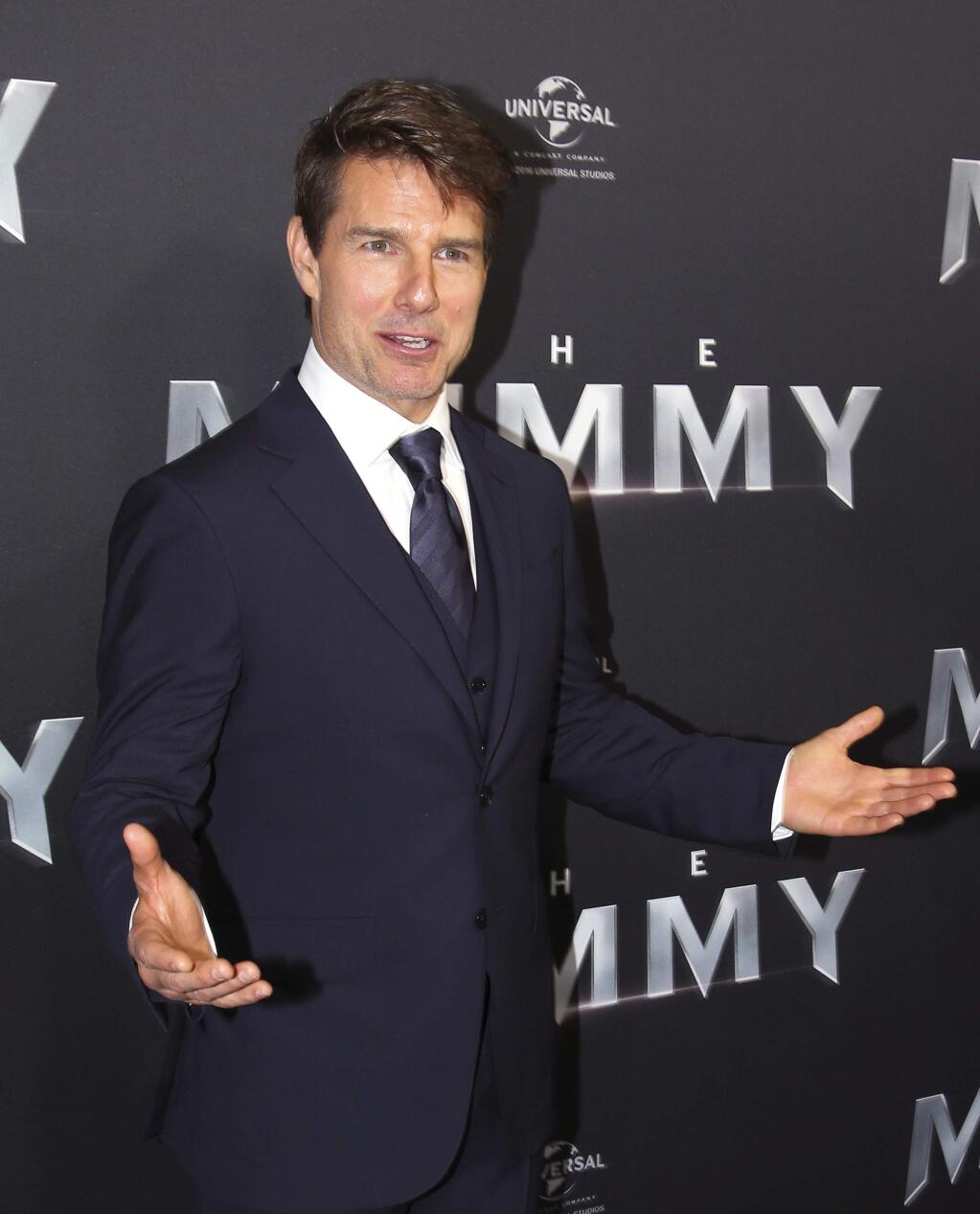 FILE - In this May 22, 2017, file photo, actor Tom Cruise arrives for the Australian premiere of his movie 'The Mummy' in Sydney, Australia. The 54-year-old actor says the long-discussed sequel to 'Top Gun' is a sure thing and should start shooting soon. He was appearing on the Australian morning news show “Sunrise” on Wednesday, May 24, 2017, when the anchors asked about it. (AP Photo/Rick Rycroft, File)
