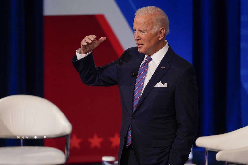 President Joe Biden participates in a CNN town hall at the Baltimore Center Stage Pearlstone Theater, Thursday, Oct. 21, 2021, in Baltimore. (AP Photo/Evan Vucci)