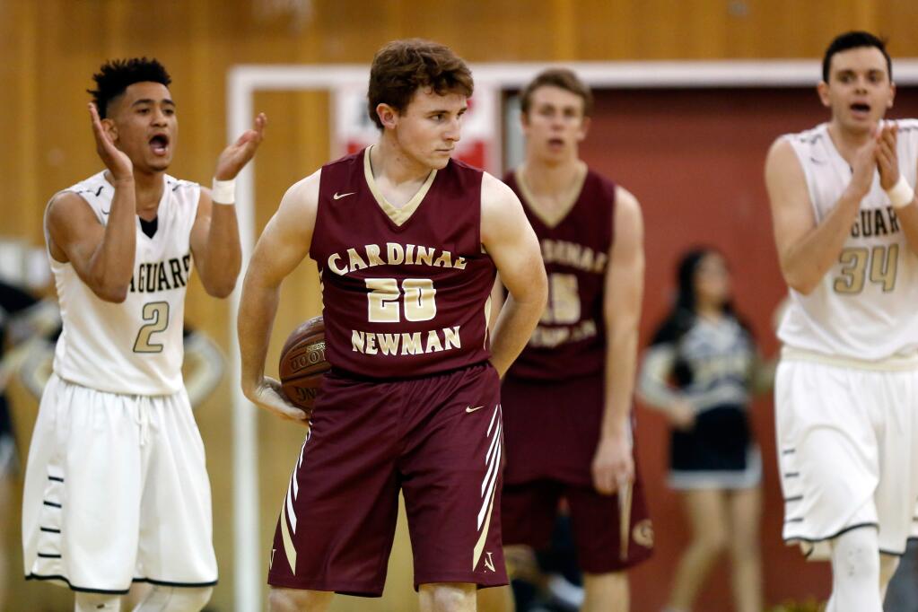 The first half of the North Bay League boys basketball tournament final game between Cardinal Newman and Windsor high schools in Santa Rosa on Friday, Feb. 19, 2016. (Alvin Jornada / The Press Democrat)
