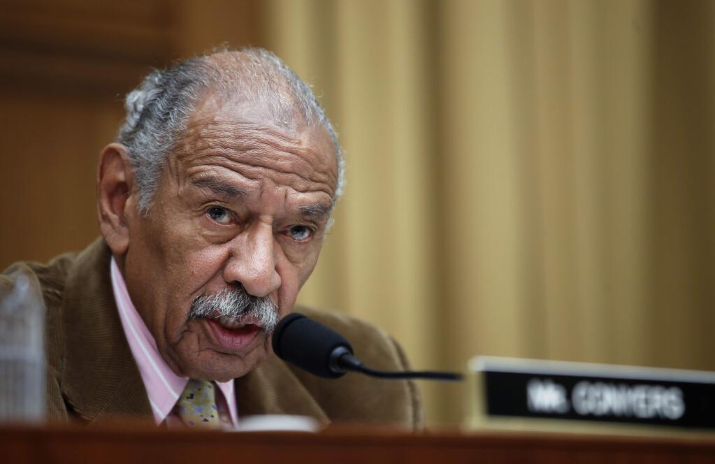 FILE- In this April 4, 2017, file photo, Rep. John Conyers, D-Mich., speaks during a hearing of the House Judiciary subcommittee on Capitol Hill in Washington. (AP Photo/Alex Brandon, File)