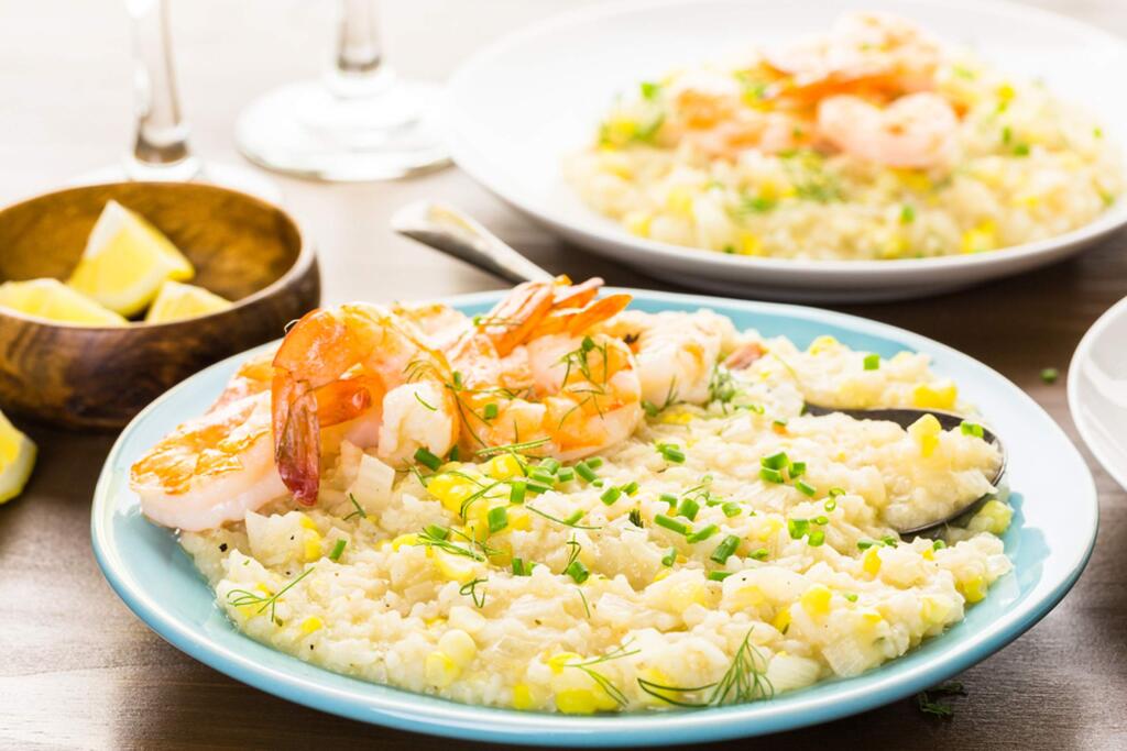 Risotto can accommodate a wide range of in-season vegetables. It makes a beautiful bed for other foods, including corn.