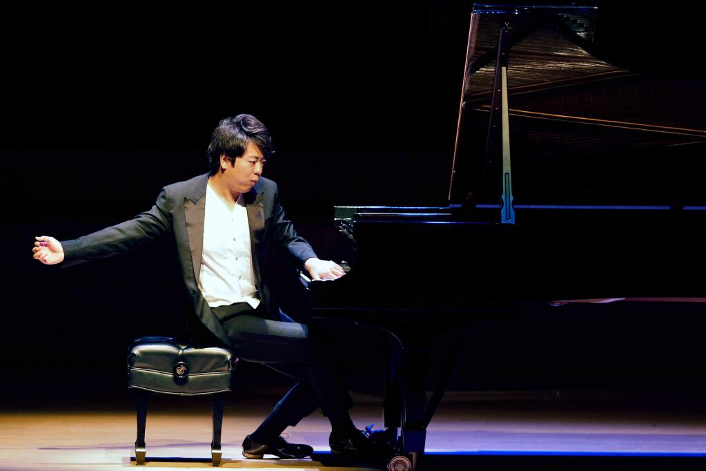 Pianist Lang Lang performs during the Green Music Center opening gala at Sonoma State University in Rohnert Park, California on Saturday, October 3, 2015. (Alvin Jornada / The Press Democrat)