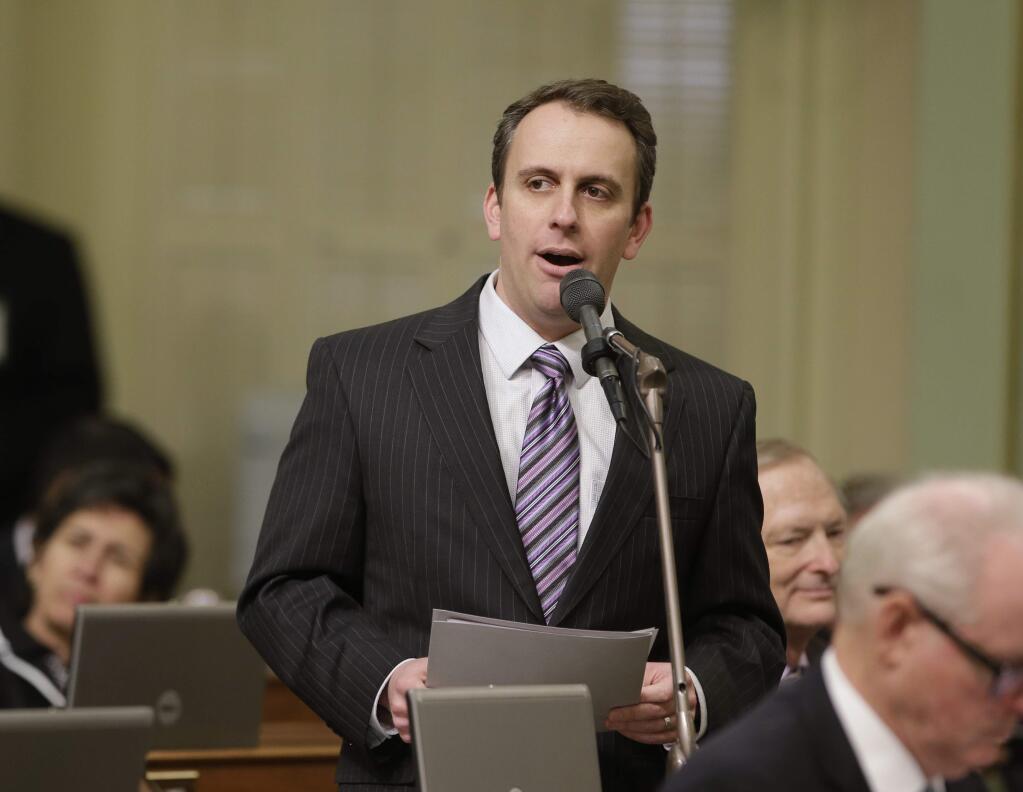 Assemblyman Marc Levine, D-San Rafael, calls on lawmakers to approve his measure to allow California voters to post photos of their marked ballot on social media during the Assembly session Wednesday, Jan. 27, 2016, in Sacramento, Calif. Levine's bill, AB144 was approved and sent to the Senate. (AP Photo/Rich Pedroncelli)