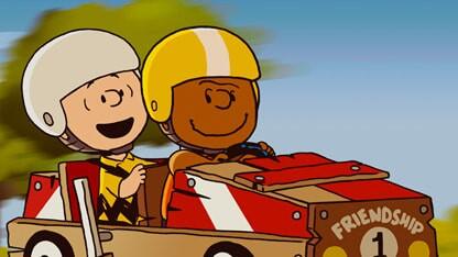 Charlie Brown and Franklin team up for a Soap Box Derby in the new Apple TV+ special “Snoopy Presents: Welcome Home, Franklin.” (Apple TV+)