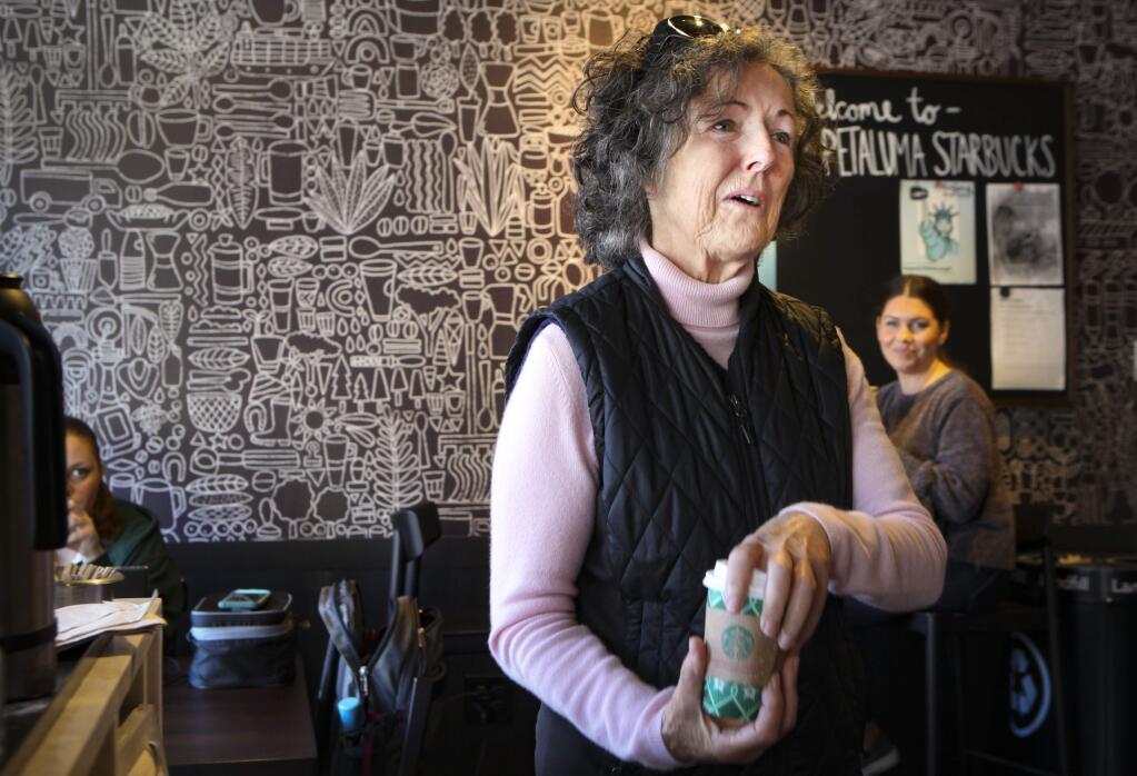 Mayor-elect Teresa Barrett  acknowledged some cheers and claps from a group of supporters at the downtown Starbucks. (CRISTINA PASCUAL/ARGUS-COURIER STAFF)