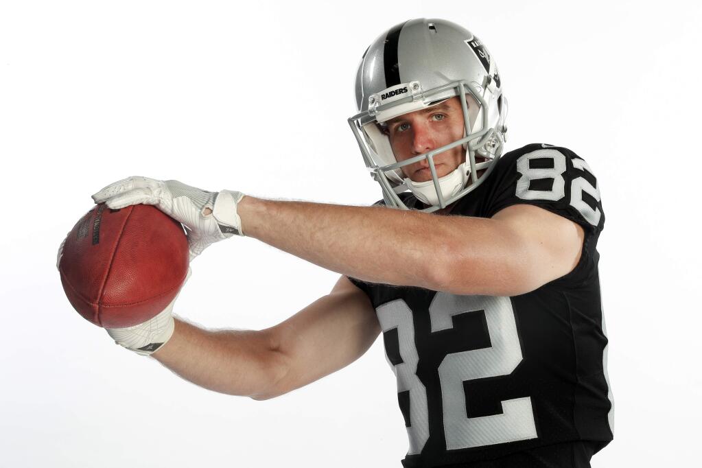 FILE - In this June 11, 2018, file photo, Oakland Raiders wide receiver Jordy Nelson (82) poses for a photo at the team's training facility in Oakland, Calif. Nelson has fit in right from the start since joining the Oakland Raiders this offseason and hopes to be the same kind of reliable receiver for Derek Carr as he was for Aaron Rodgers all those years in Green Bay. (AP Photo/Tony Avelar, File)