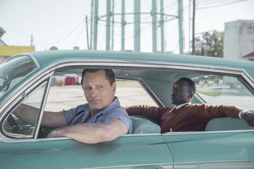 Universal PicturesViggo Mortensen and Mahershala Ali star as Tony Lip (Mortensen), a bouncer from an Italian-American neighborhood in the Bronx, who is hired to drive Dr. Don Shirley (Ali), a world-class Black pianist, on a concert tour from Manhattan to the Deep South, where they must rely on 'The Green Book' to guide them to the few establishments that were then safe for African-Americans in 'The Green Book.'