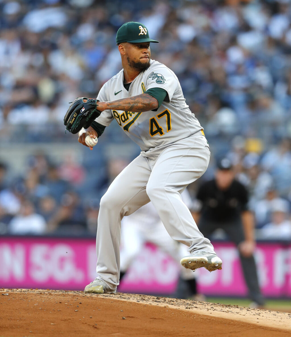 Oakland Athletics starting pitcher Frankie Montas throws to a Yankees batter during the first inning Tuesday, June 28, 2022, in New York. (Noah K. Murray / ASSOCIATED PRESS)