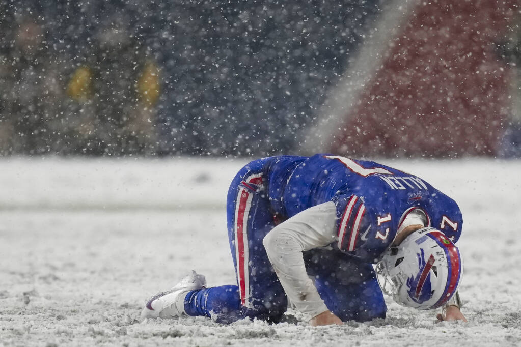 Buffalo Bills quarterback Josh Allen (17) reacts after being sacked by the Cincinnati Bengals during the fourth quarter of an NFL division round football game, Sunday, Jan. 22, 2023, in Orchard Park, N.Y. (AP Photo/Seth Wenig)