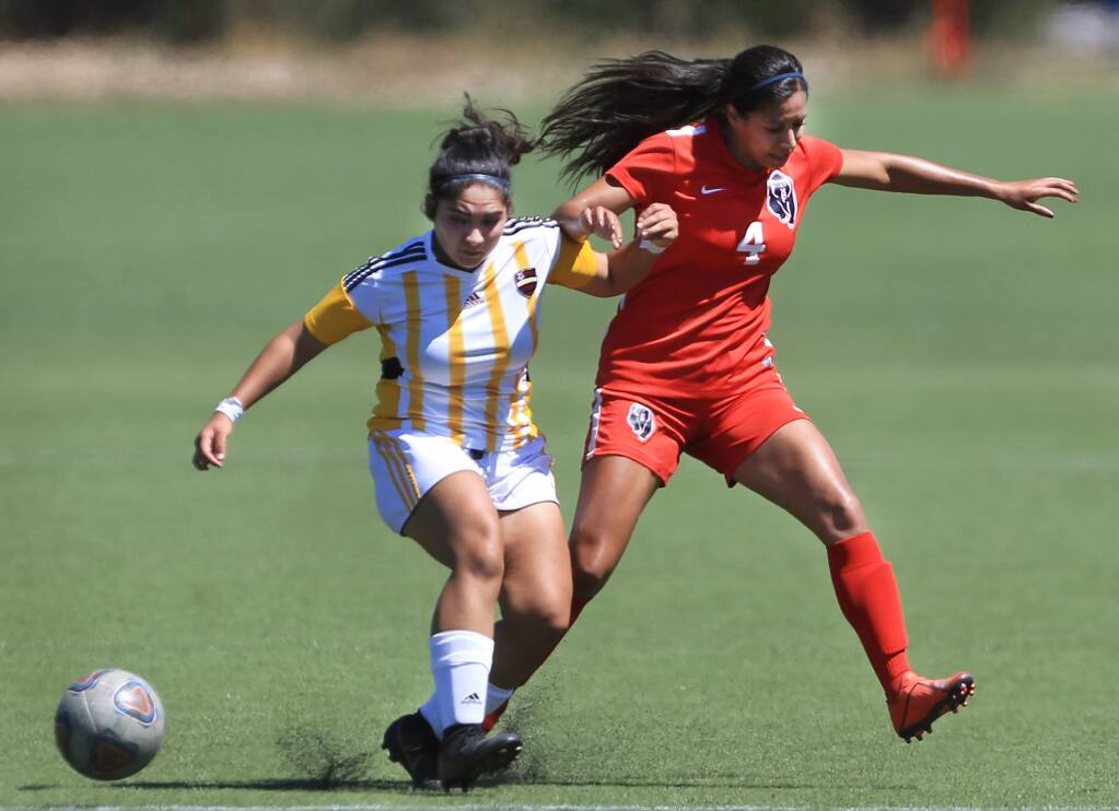 SRJC's Krystal Garcia, right, battles for possession with College of the Redwoods' Amy Reyes, Friday, Sept. 6, 2019 during the Bear Cubs' 4-0 win. (Kent Porter / The Press Democrat) 2019