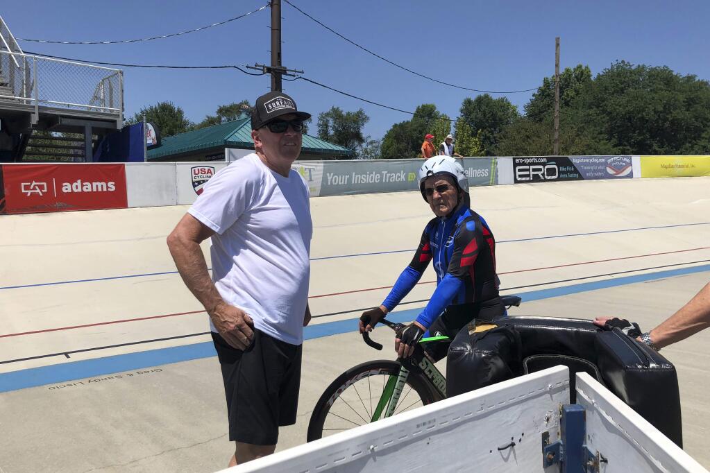 In this photo taken on July 10, 2018, Carl Grove, a 90-year-old record-setting cyclist, races at the USA Cycling Masters Track Nationals in Breinigsville, PA. (Kathy Watts via AP)