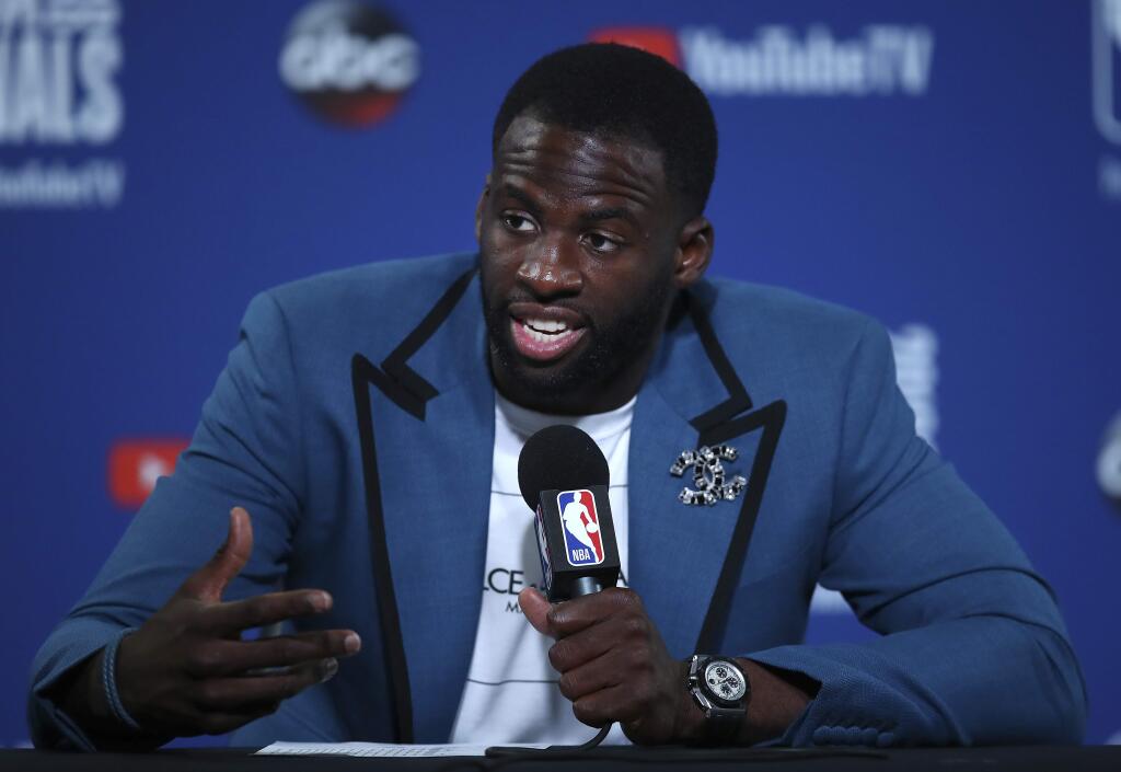 Golden State Warriors forward Draymond Green speaks at a news conference after Game 2 of the NBA Finals between the Warriors and the Cleveland Cavaliers in Oakland, Sunday, June 3, 2018. The Warriors won 122-103. (AP Photo/Ben Margot)