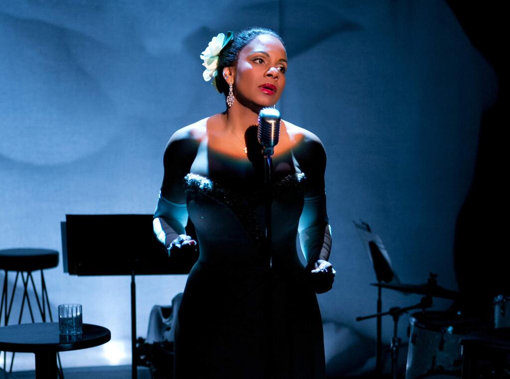 This photo provided by Jeffrey Richards Associates shows Audra McDonald as Billie Holiday in 'Lady Day at Emerson's Bar & Grill'. McDonald has propelled her new Broadway show into profitability. Producers of the play 'Lady Day at Emerson's Bar & Grill' said Tuesday that theyíve recouped their $2.6 million initial investment. In the show, McDonald portrays Billie Holiday in one of her last concerts, offering stories and performing about a dozen of Holiday's best known songs, including 'God Bless the Child,' 'What a Little Moonlight Can Do,' and 'Strange Fruit.' (AP Photo/Jeffrey Richards Associates, Evgenia Eliseeva)