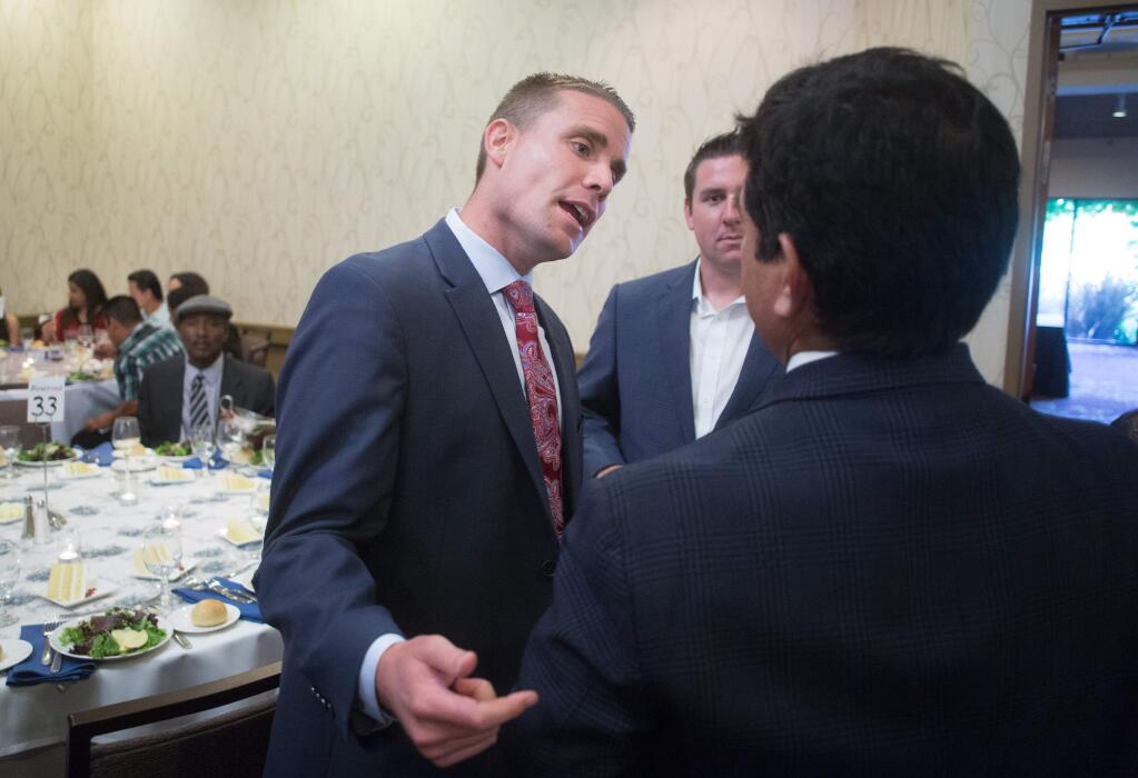 CA State Senator Mike McGuire -D talks with attendees of the Hispanic Chamber of commerce of Sonoma County's 2015 annual Dream Big Scholarship Gala at the Double Tree in Rohnert Park, Calif. Saturday, June 27, 2015.