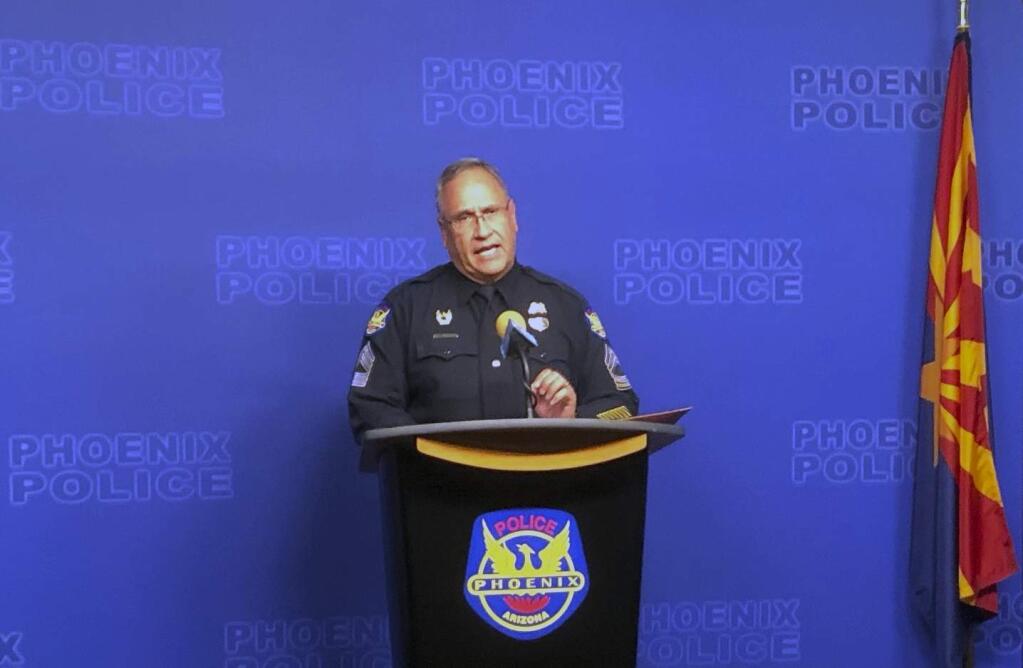 Sgt. Tommy Thompson, of the Phoenix Police Department, speaks to the media Wednesday, Jan. 9, 2019, in Phoenix, regarding the case of a woman in a vegetative state at a long-term care facility who recently gave birth. Officials with the San Carlos Apache tribe say the 29-year-old woman was an enrolled tribal member. Phoenix police have served a search warrant to get DNA from all male employees at the facility in Phoenix. (AP Photo/Brian Skoloff)