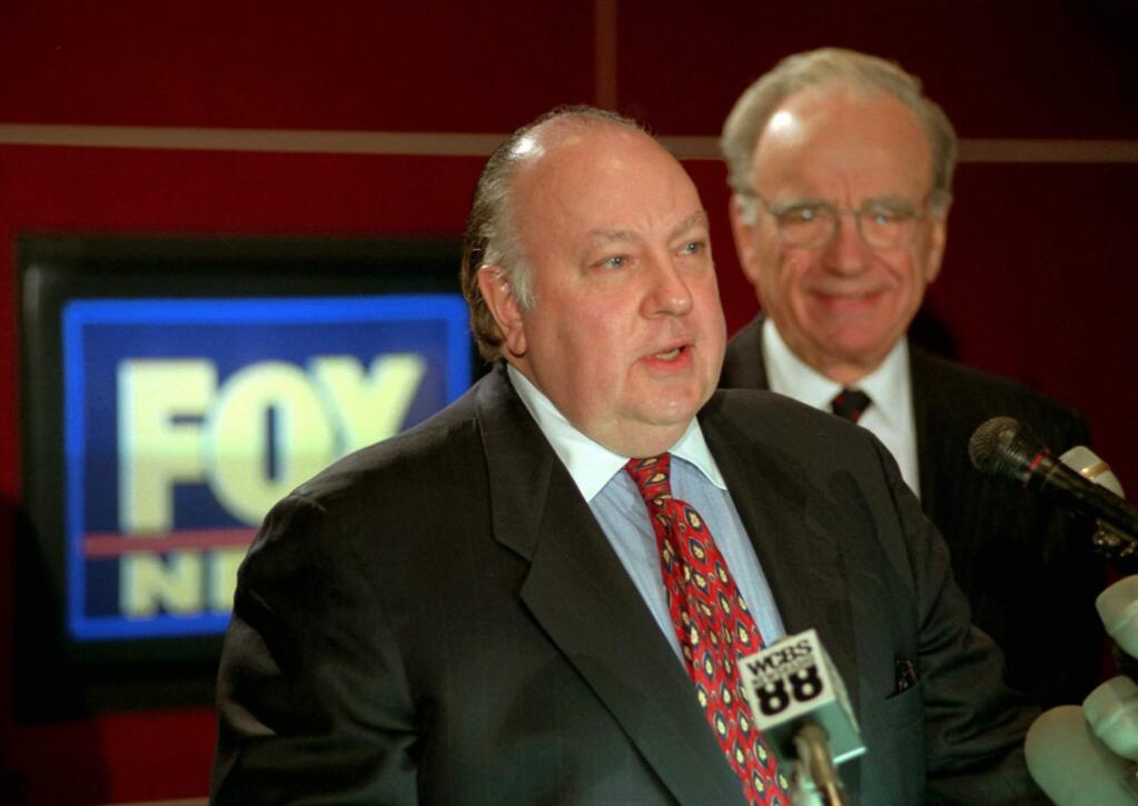 FILE - In this Jan. 30, 1996 file photo, Roger Ailes, left, speaks at a news conference as Rupert Murdoch looks on after it was announced that Ailes will be chairman and CEO of Fox News. Former Fox News host Andrea Tantaros has charged in a lawsuit filed Monday, Aug. 22, 2016, she was sexually harassed by former network chief Roger Ailes and other top executives. The defendants in the lawsuit filed Monday in Manhattan state Supreme Court include William Shine, who was named co-president of Fox News after Ailes resigned because of a sexual harassment lawsuit filed by another former anchor, Gretchen Carlson. (AP Photo/Richard Drew, File)