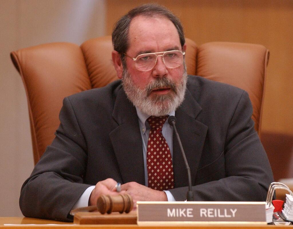 Sonoma County Supervisor Mike Reilly speaks in favor of a resolution supporting same-sex marriage on Tuesday, April 20, 2004. (Christopher Chung/ The Press Democrat )