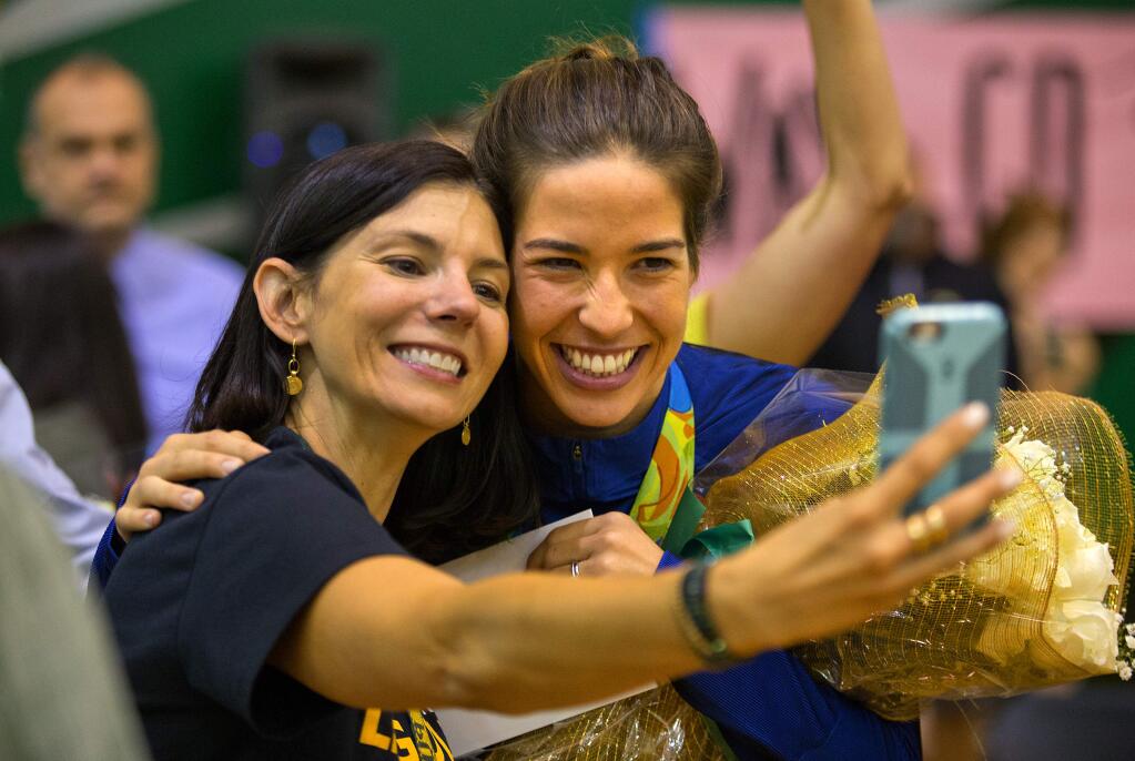 Olympic swimmer Maya DiRado poses for a selfie with Maria Carrillo High School english teacher Natasha Deakins. (JOHN BURGESS/The Press Democrat)