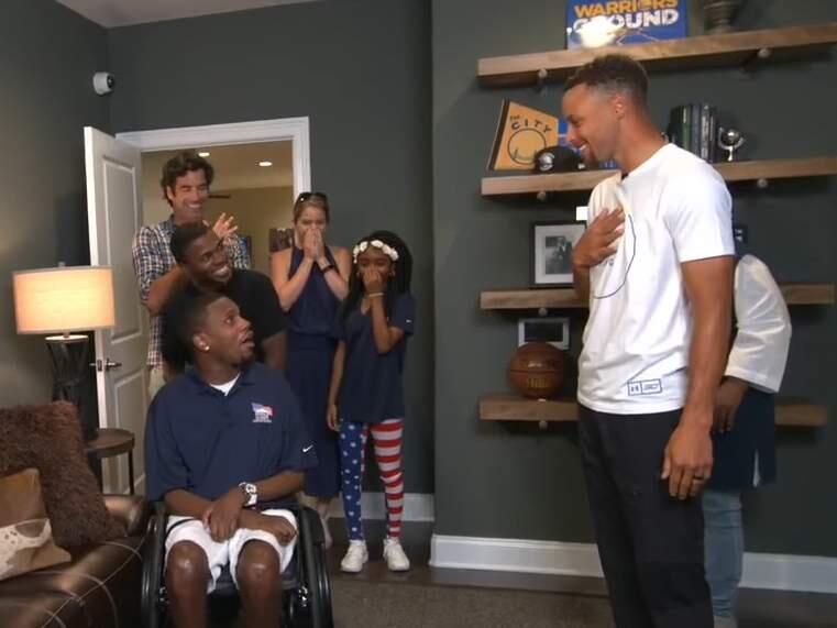 Stephen Curry was part of the surprise as a disabled veteran was shown around his brand new home. (YOUTUBE)
