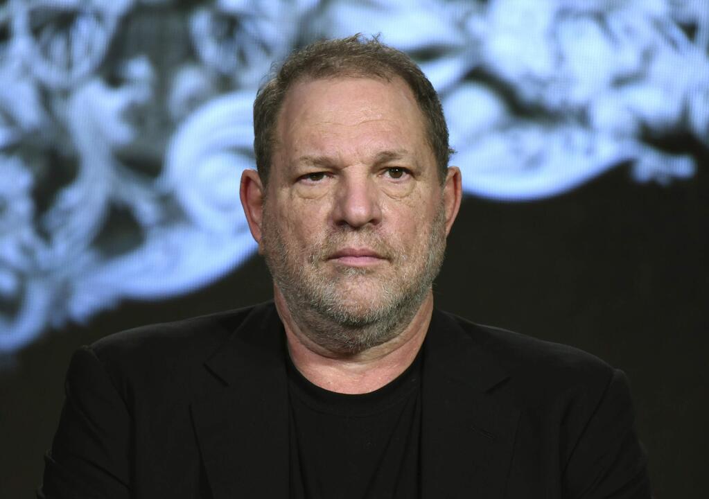 FILE - In this Jan. 6, 2016, file photo, producer Harvey Weinstein participates in a panel at the A&E 2016 Winter TCA in Pasadena, Calif. The Weinstein Co., mired in a sex scandal, may be putting itself up for sale. The company said Monday, Oct. 16, 2017, that it is getting an immediate cash infusion from Colony Capital and is in negotiations for the potential sale of all or a significant portion of the movie studio responsible for films like 'Shakespeare in Love,' and 'Gangs of New York.' (Photo by Richard Shotwell/Invision/AP, File)