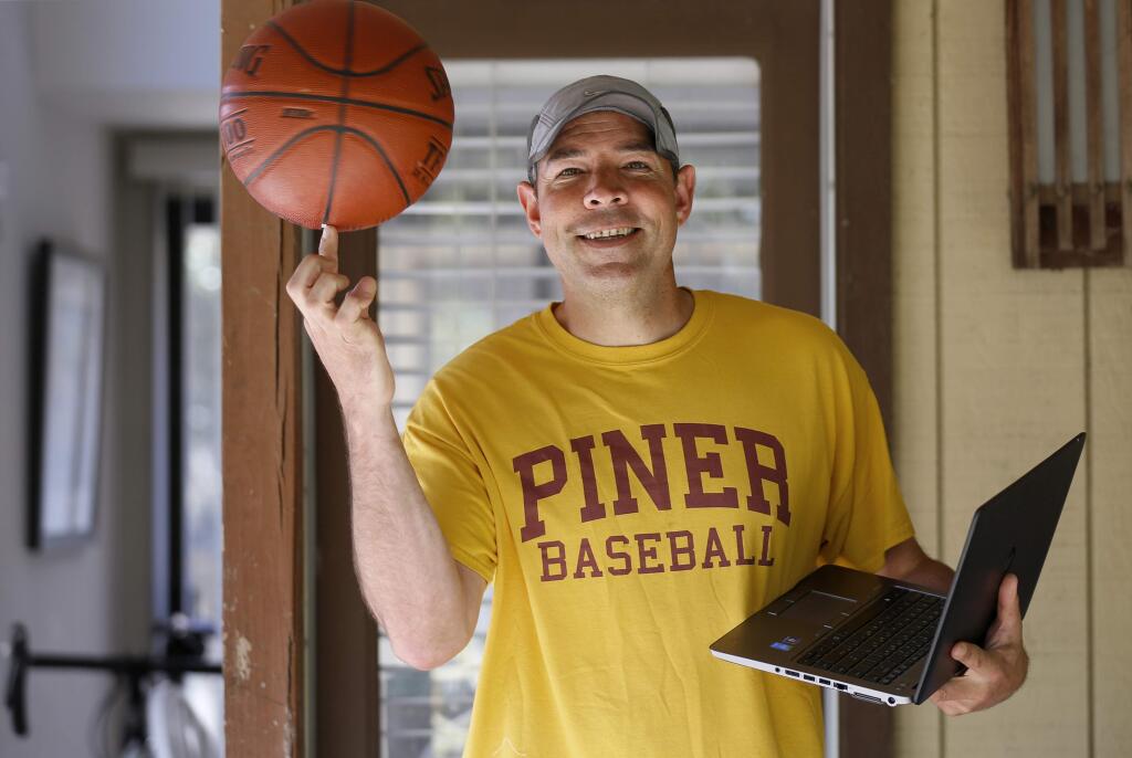 Piner High School physical education teacher Ernesto Aubin now teaches his students on the internet from his home in Sebastopol, on Tuesday, April 28, 2020. (BETH SCHLANKER / The Press Democrat)